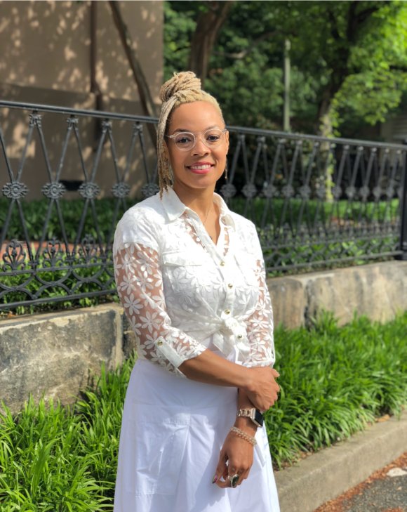 Dr. Tiffany Jana standing outside smiling